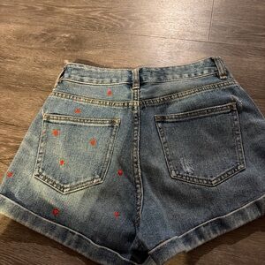 Stylish Denim Shorts with Red Accents